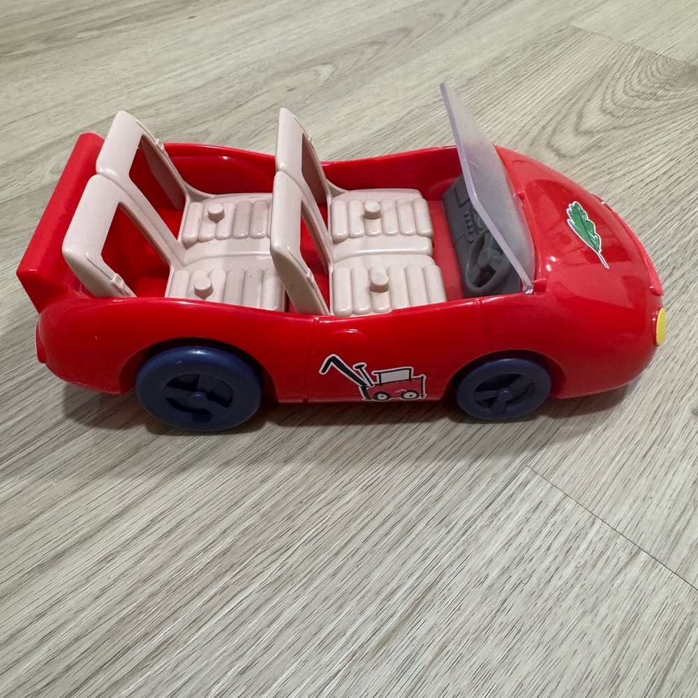 Bluey convertible.  Red Toy Car with Cream Seats
